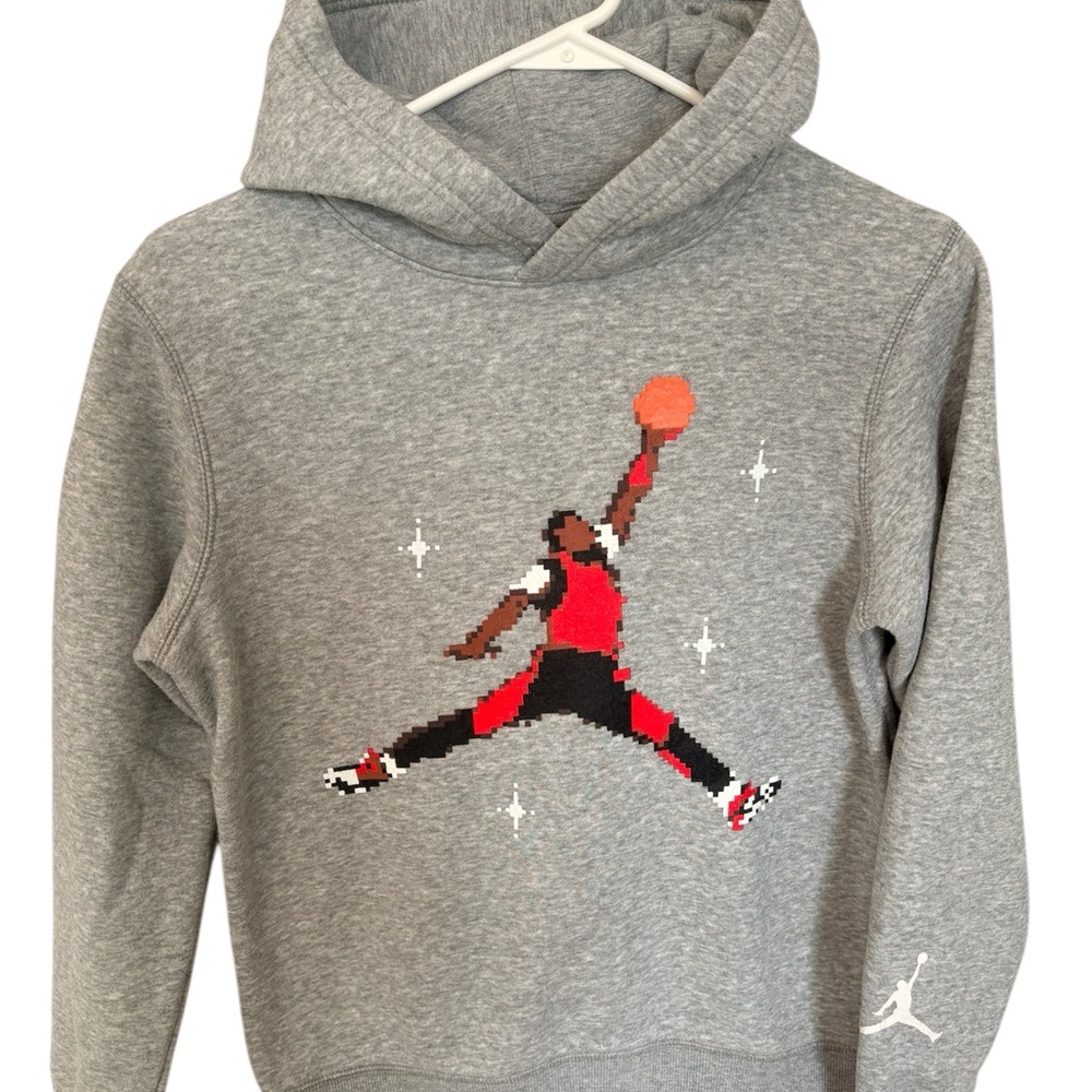 Kids large Jordan Sketch Pullover Hoodie featuring‎ a pixelated Jumpman logo